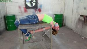 jimhunterslair.com -  Stretched across the table in a cruel inverted hogtie thumbnail